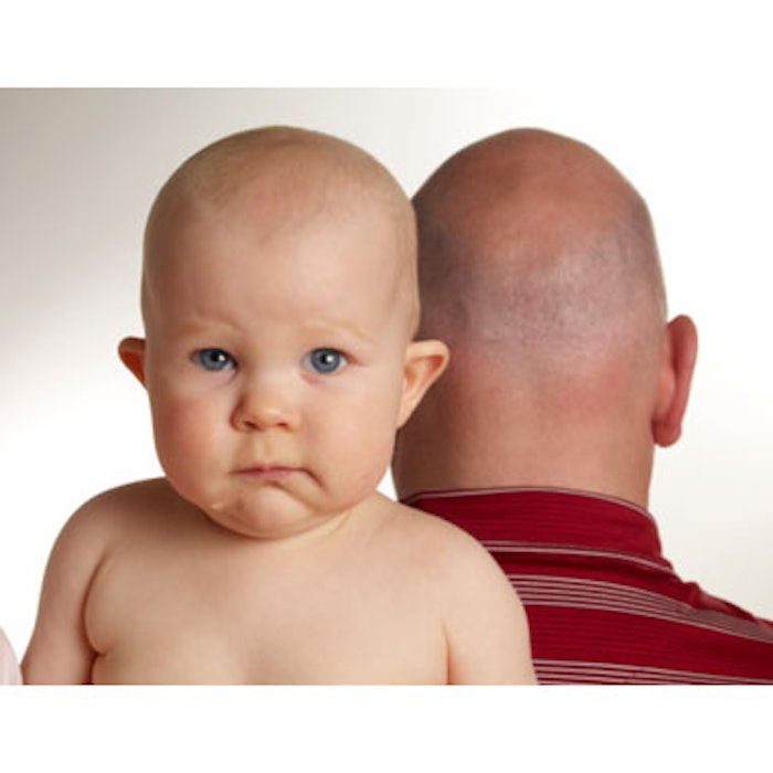 Balding man with baby