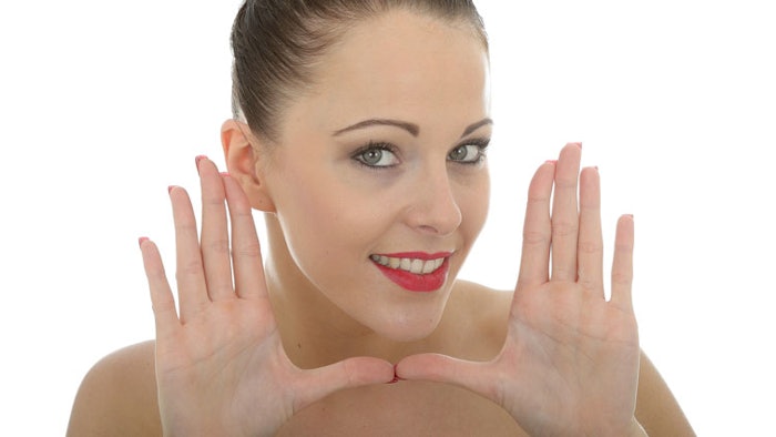 Woman Holding Her hands by her face