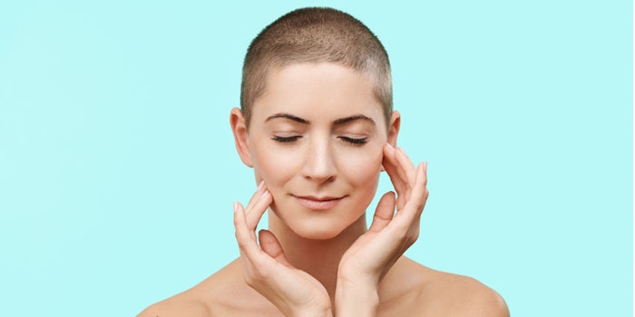 woman touching face