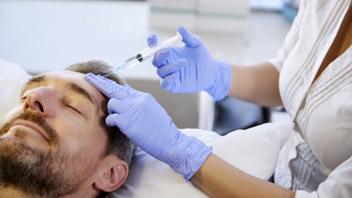 Man undergoing forehead injection