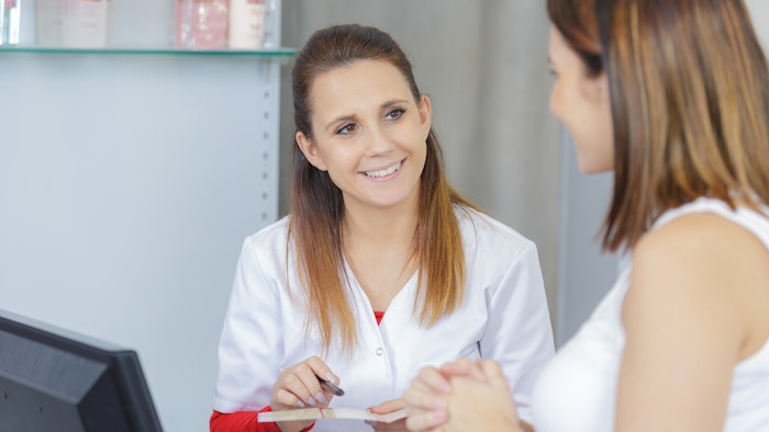 Woman helping customer