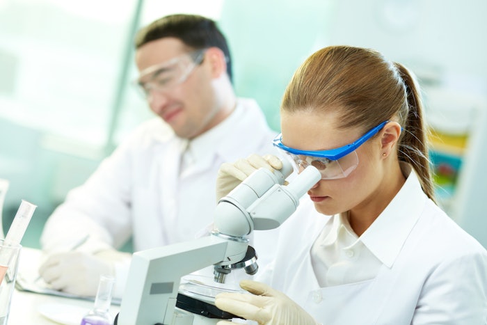 Researchers in lab