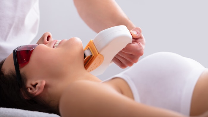 Woman undergoing IPL treatment