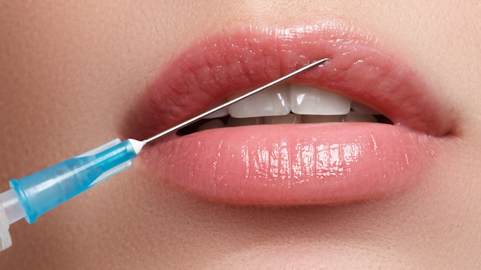 woman getting lip filler