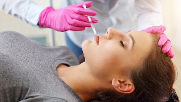 Woman getting filler