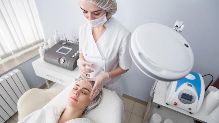 Woman getting botox injections