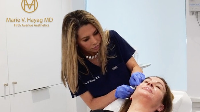 Dr. Maire Hayag performing a service