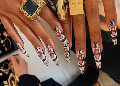Megan Thee Stallion's Tiger nails by Coca Michelle