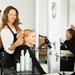 Hair stylists working in a salon
