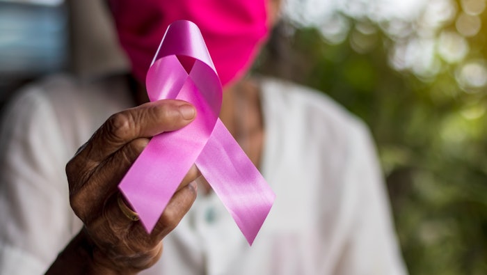 old woman supporting breast cancer awareness