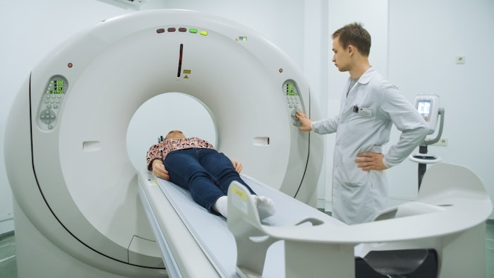 woman receiving MRI