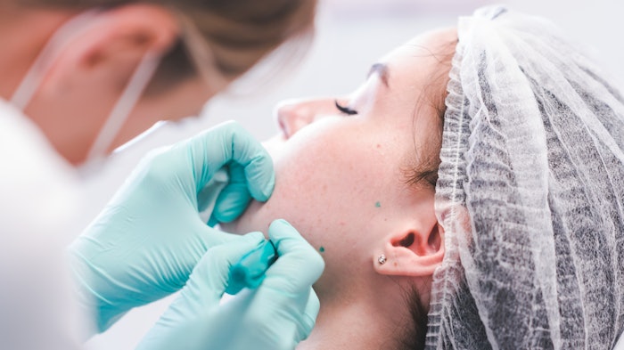 woman receiving consultation for facial contouring