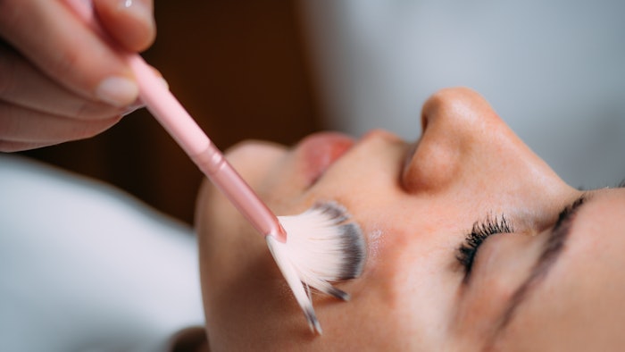 woman receiving hyperpigmentation facial treatment