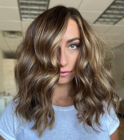 Shoulder-length, side-parted hair