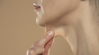 woman being evaluated for neck countouring