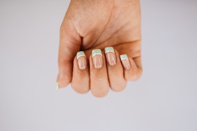Sage green French tip with white outline.