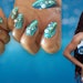 Manicurist Yoko Sakakura created Halle Bailey's nail look for The Little Mermaid Premiere at the Dolby Theater in Hollywood.