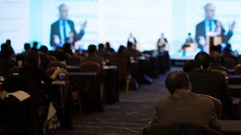educational panel presentation on a stage