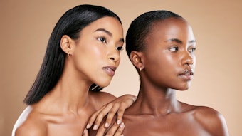 two black women posing