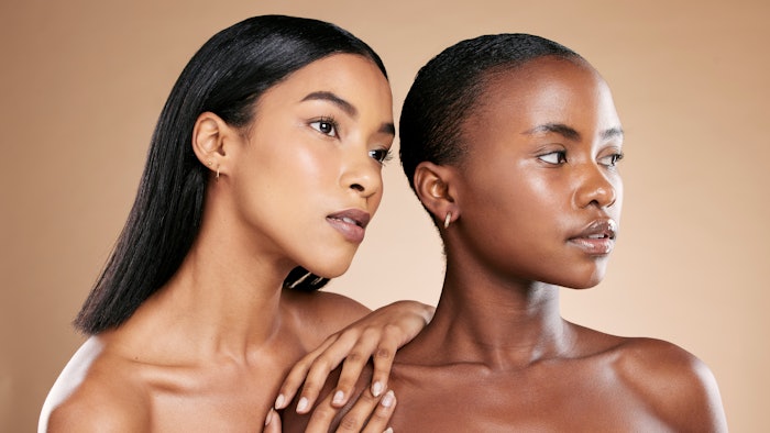 two black women posing