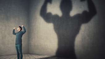 man posing and flexing