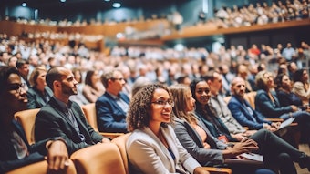 multi-ethnic people at educational conference presentation