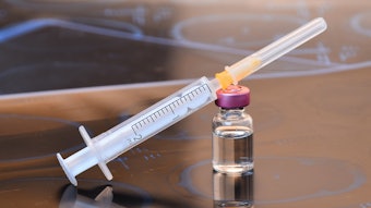 Glass Medicine Vials with botox, hualuronic, collagen or flu Syringe (shallow DOF)