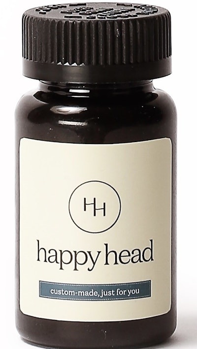 brown bottle with cream-colored happy head logo/supplement label