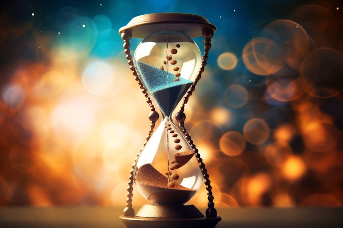 Abstract anti-aging concept featuring an hourglass and molecular structures