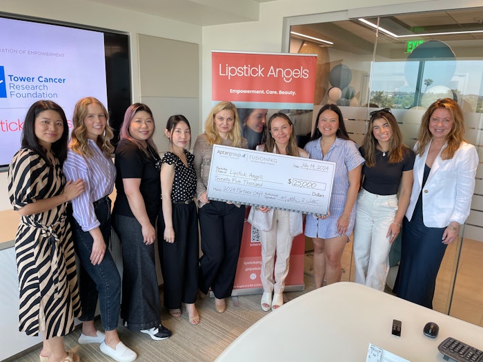 The FusionPKG team delivered a life-sized check for $25,000 to the Lipstick Angels office in California on July 16, 2024. From left: Jo Yang, Kailey McElwee, Samantha Tsang-Lee, Nancy Wang, Eva Ehn, Renata Helfman, Keiko Hartmann, Brianna Filos and Amy Holiber.