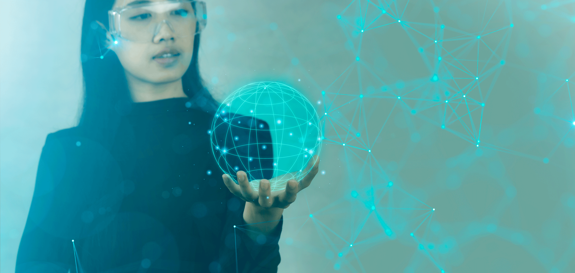 scientist holding digital depiction of globe with network connected