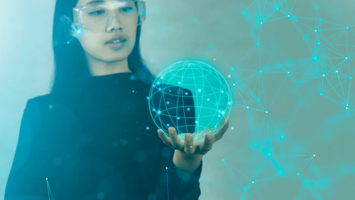 scientist-holding-digital-depiction-of-globe-with-network-connected