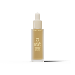 Photo of face serum bottle with Manuka Health logo on front.