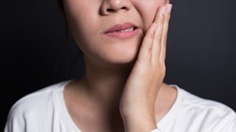 Person touching their face