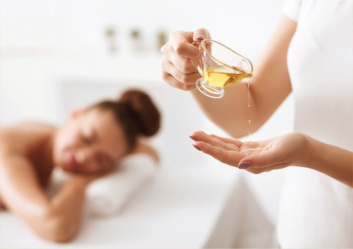 Massage Oil with Woman getting massage