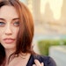 beautiful brunette healthy hair city pollution sun exposure