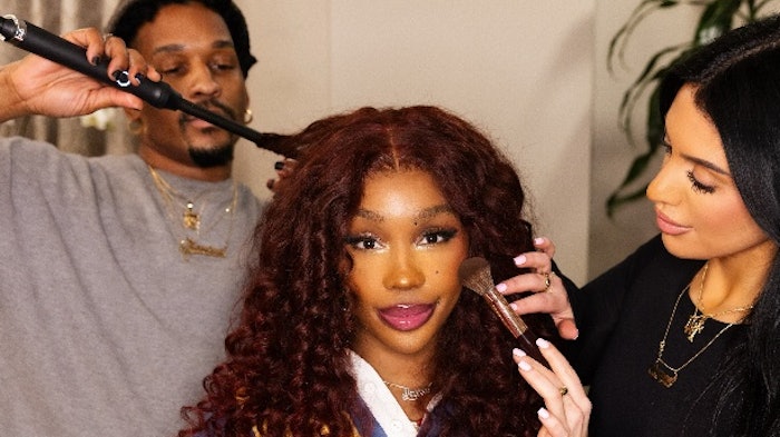 Devante Turnbull styles SZA's hair for the Super Bowl Halftime show.