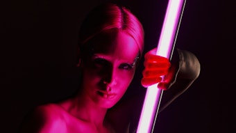 Woman Holding Led Pink Light Light Saber Concept