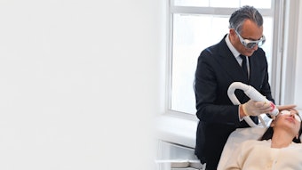 Olivier Amar, MD facilitating Aerolase treatment.