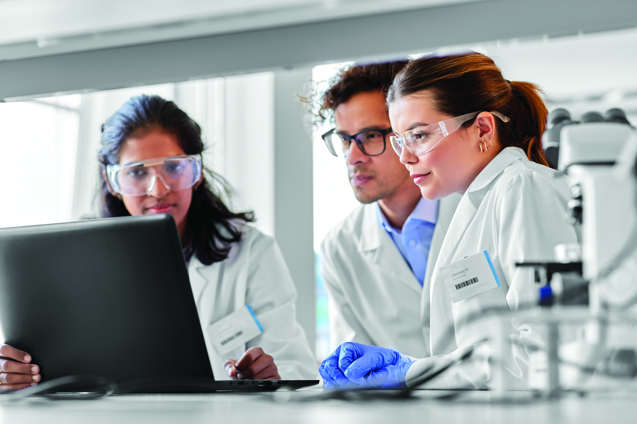 U Cinn Young Chemists At Computer In Lab Collaboration Adobe Stock 525719219