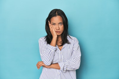 Even staying indoors can't protect skin from the winter blues; staying cozy means more exposure to indoor allergens like dander.