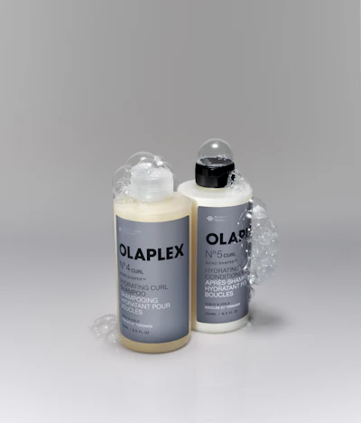 By embedding bond repair, hydration and definition into the shampoo-conditioner system itself, Olaplex is effectively repositioning wash-day from a maintenance step into a controlled performance stage in the styling process.