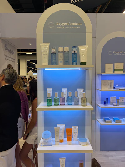 OxygenCeuticals skincare product display booth