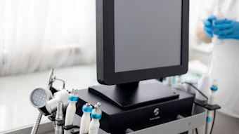 Medical diagnostic equipment with multiple handheld instruments and monitor display in clinical setting